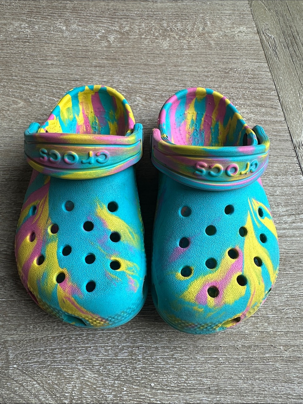 CROCS Kids Clog in Turquoise with Yellow & Pink Swirl